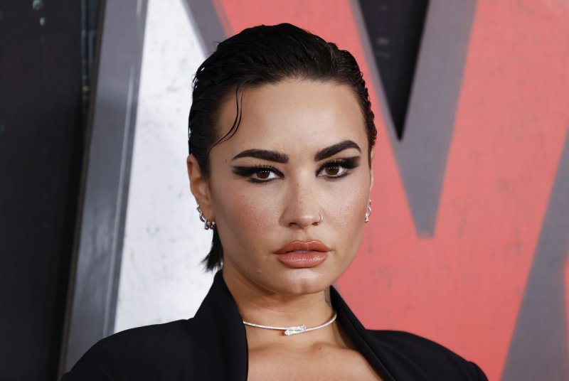 Demi Lovatos Collaborations Chart-Toppers and Fan Favorites 4 - Kanye West Shop Demi Lovato shares rock version of Confident - Kanye West Shop